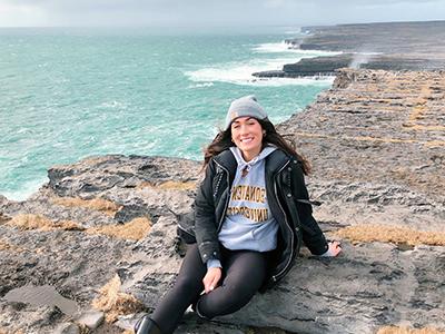 Study abroad student Casey Wolfe on the coast of Galway, Ireland